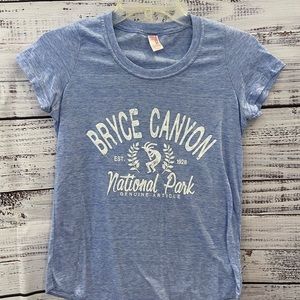 Really soft Prairie Mountain tee. Heathered blue and white.